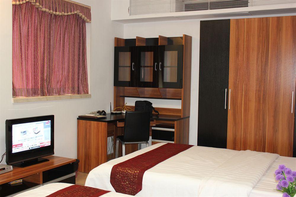 גואנגג'ואו She & He Service Apartment Huifeng מראה חיצוני תמונה