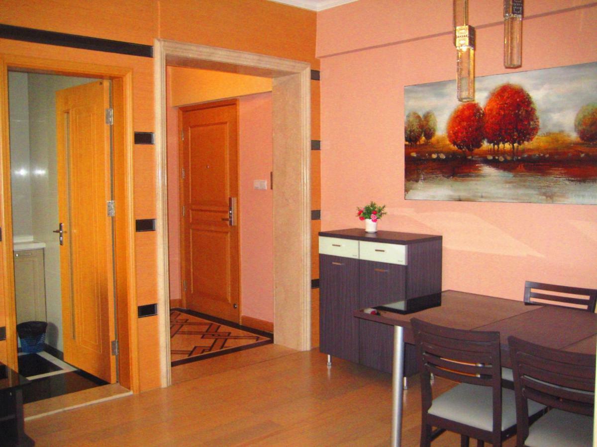 גואנגג'ואו She & He Service Apartment Huifeng מראה חיצוני תמונה
