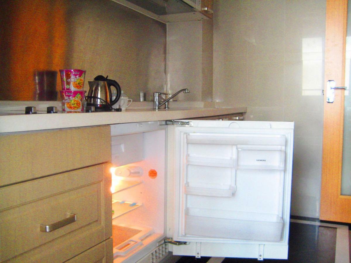 גואנגג'ואו She & He Service Apartment Huifeng מראה חיצוני תמונה
