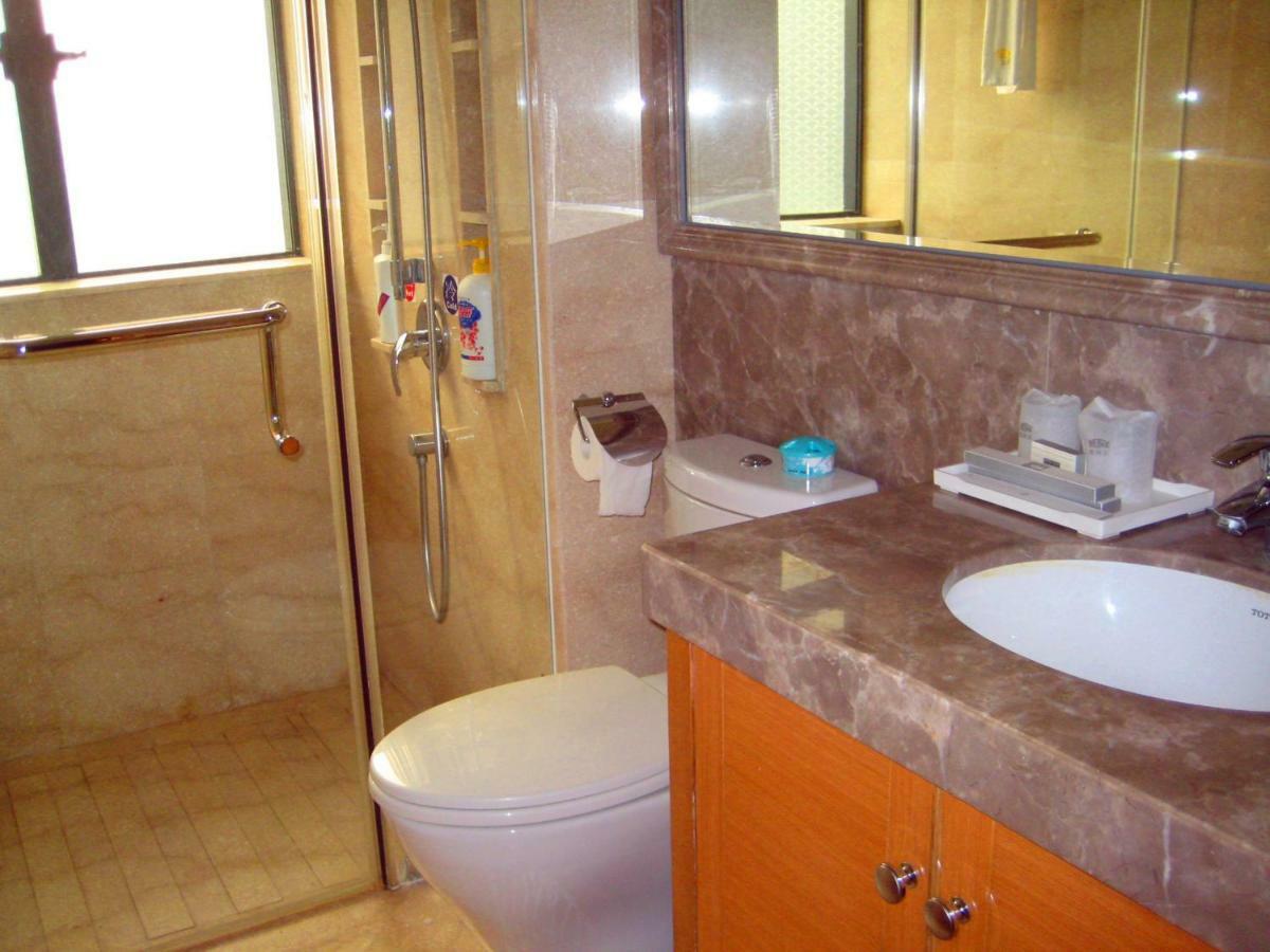 גואנגג'ואו She & He Service Apartment Huifeng מראה חיצוני תמונה